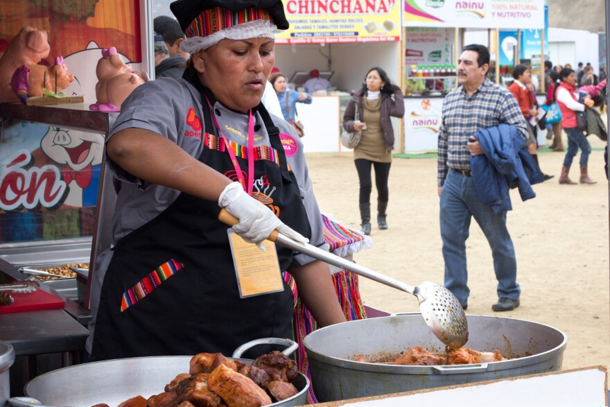 A vendor cooks a Peruvian stew at Mistura in Lima, the largest food festival in Latin America.