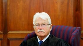 Senior Judge Alex Munson dies at 84; honored for decades of service across the Pacific.