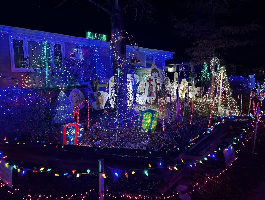 Thousands of LED lights surround Toy Story character standups.