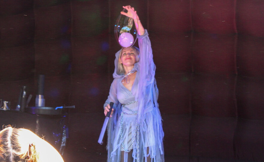 Katya performs "Alluring Bubble Adventures" for the crowd.