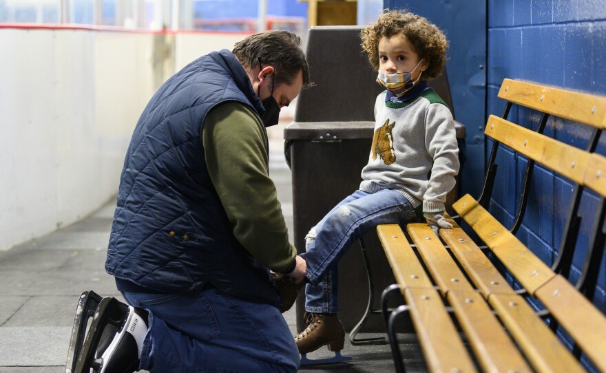 Dad laces up skates