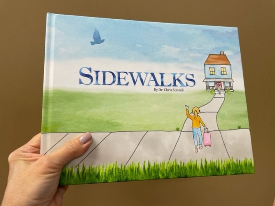 The cover of Sidewalks, a children's book by local educator, Dr. Chris Simrell.