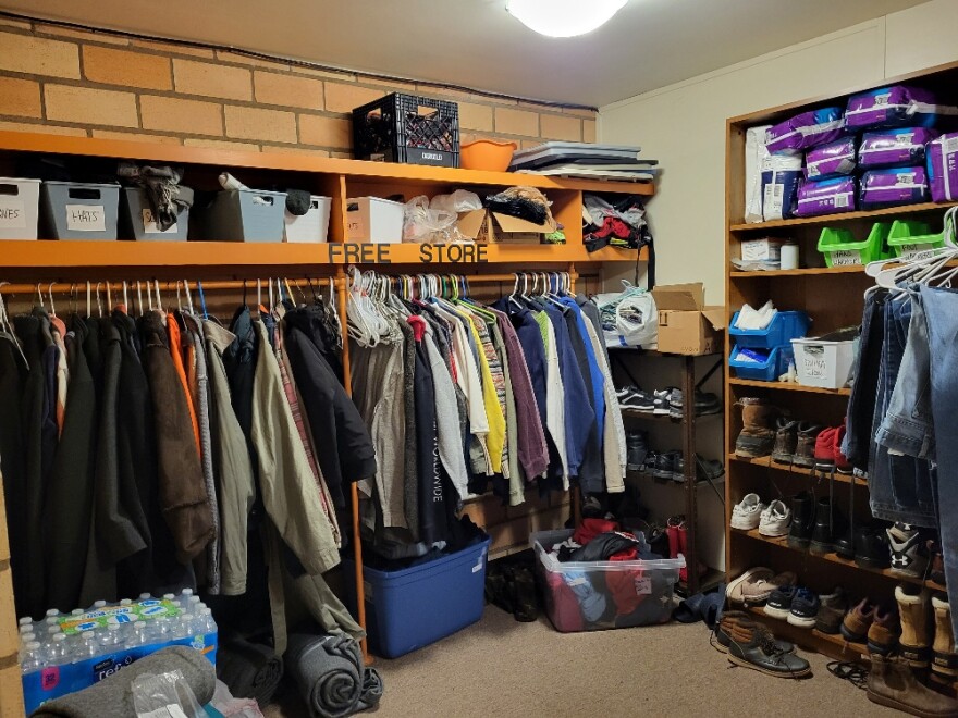 A closet is full of free clothes, shoes and coats