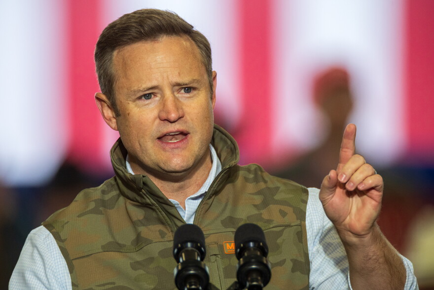 Aaron Flint, the Republican candidate for Montana's 1st Congressional District, speaks at Vice President JD Vance's rally in support of Montana's Republican congressional candidates ahead of the midterm elections in an airport hangar in Belgrade, Mont., on October 26, 2026.