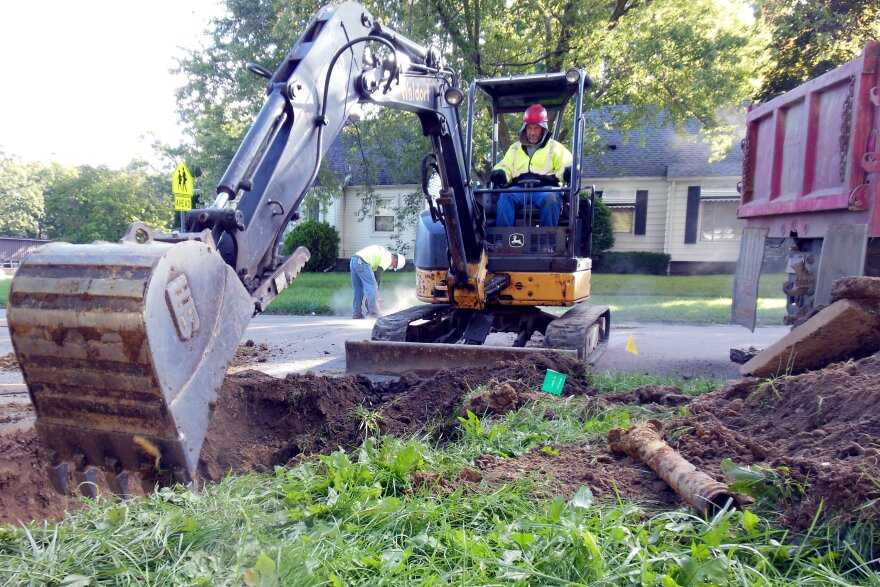 Crews replace a lead water service line in Flint.