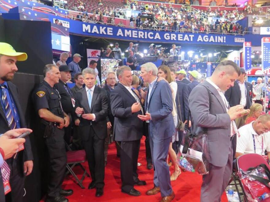 Ohio Republican Party Chair Matt Borges talks with U.S. Sen. Rob Portman (R-OH) on the convention floor at the RNC in Cleveland in July.