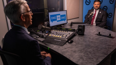 RIPTA CEO Christopher Durand speaks with Ocean State Media political reporter Ian Donnis. Credit: Michael Frank/Ocean State Media
