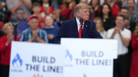 President Donald Trump speaks about the proposed Alaska LNG project at a campaign rally at the Curtis D. Menard Memorial Sports Center, Tuesday, Oct. 13, 2026, in Wasilla, Alaska.