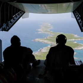 Members of the U.S. Coast Guard search remote Bahamian islands for evidence of rafters in August, 2022.