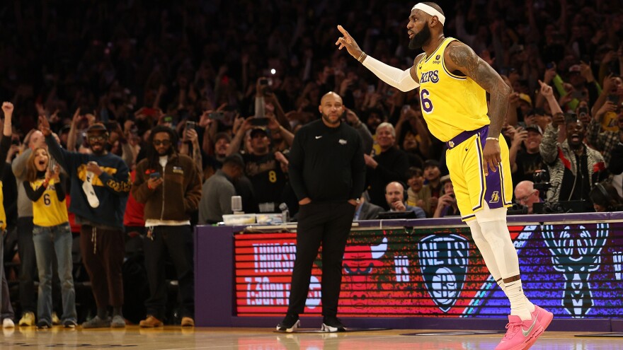 James reacts after scoring to pass Abdul-Jabbar's career record total of 38,387 points against the Oklahoma City Thunder in Los Angeles.