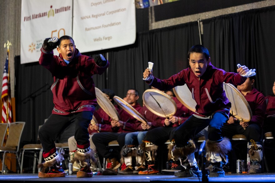 Members of Ulgunigmiut Dancers, from Wainwright, perform on Oct. 16 during Quyana.