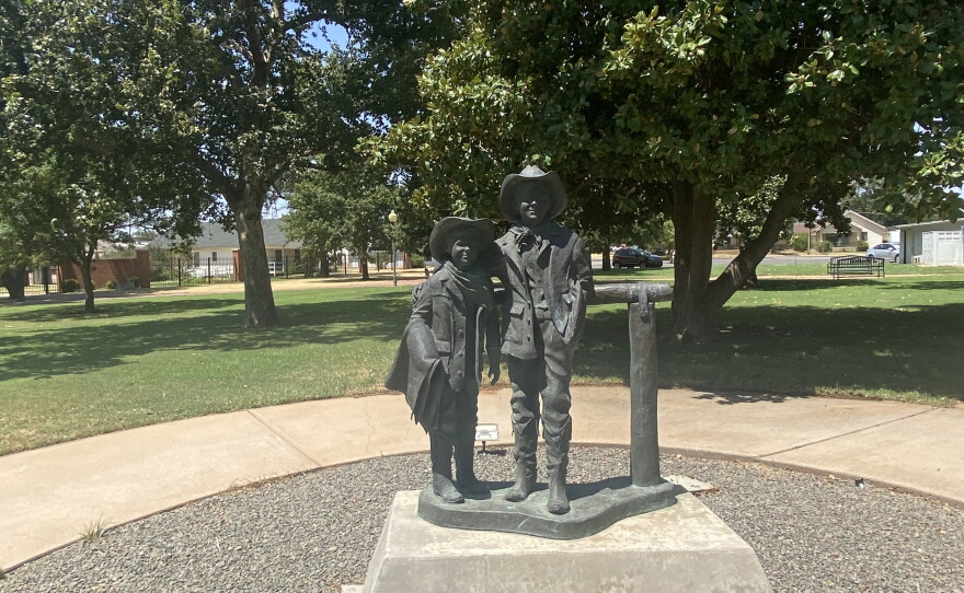 This statue of Temple and Bud Abernathy stands outside the courthouse of Frederick in southwestern Oklahoma