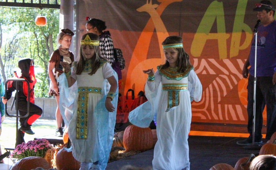 Egyptians Abigail and Addison walk the stage during the costume contest.