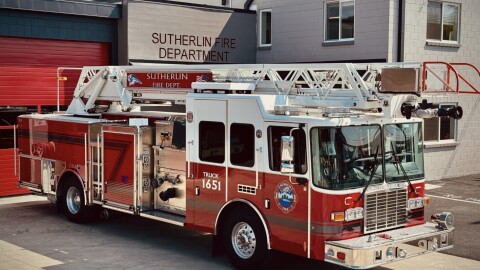 This ladder truck, Engine 1651, was purchased used for $750,000 using Public Safety Fee funds. Engine 1651, shown here in fall of 2025, carries structure firefighting tools and the 80-foot aerial ladder on top is used to flow water streams at large fires. It carries 400 gallons of water.