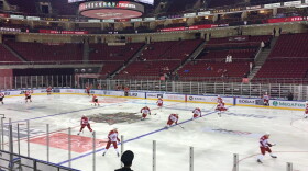 The Kunlun Red Stars, China's hockey team, warm up before a game.