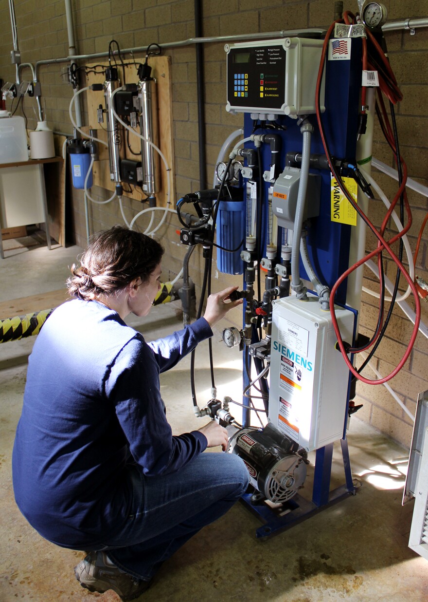 Dr. Adrienne Menniti, a senior process technologist at Clean Water Services, operates the company's high-purity water system. It uses ultra-filtration, reverse osmosis, enhanced oxidation and disinfection to create high-purity water.