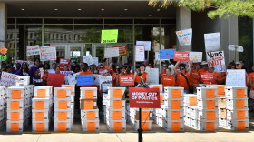 Supporters for Prop 2 in Lansing, Mich. dropping off signatures for the ballot measure in May. (Photo courtesy of Michiganders for Money Out of Politics)