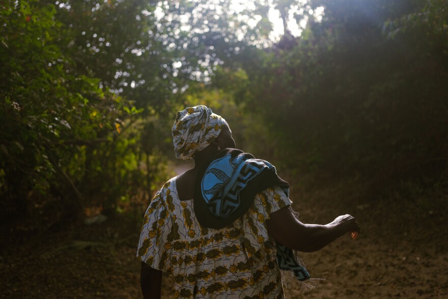 Diakine Sambou, queen of the sacred forest of Kaoupoto, on Feb. 23, 2021, in Mlomp, Senegal.