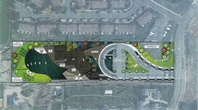 A preliminary plan for Rising Heights Academy shows the school layout would include playgrounds, parking and outdoor gathering areas around the primary school building.