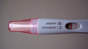 Positive home pregnancy test.