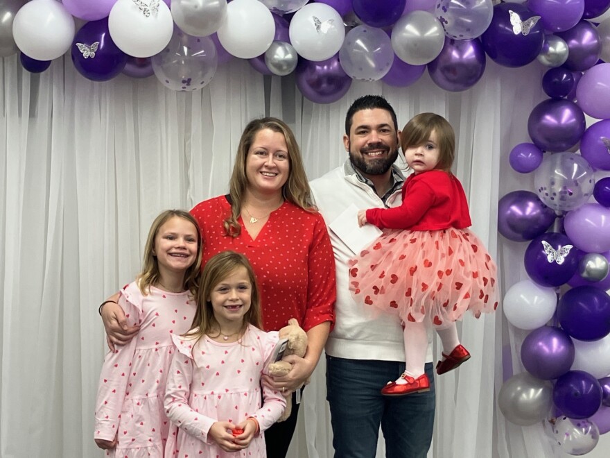 Celebrating National Adoption Day are Naliana, left, Rayna, Jaime, Matthew and Stella Ade.