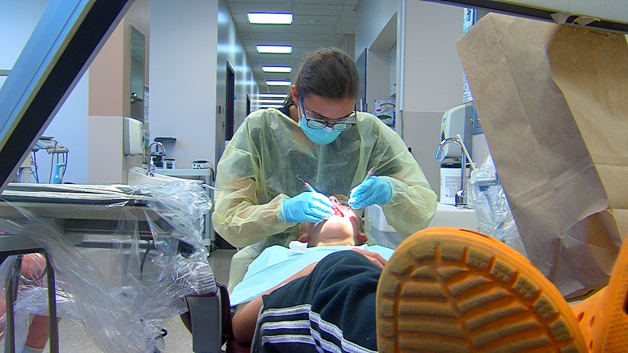 SIU Dental Hygiene Clinic students performing state required exam