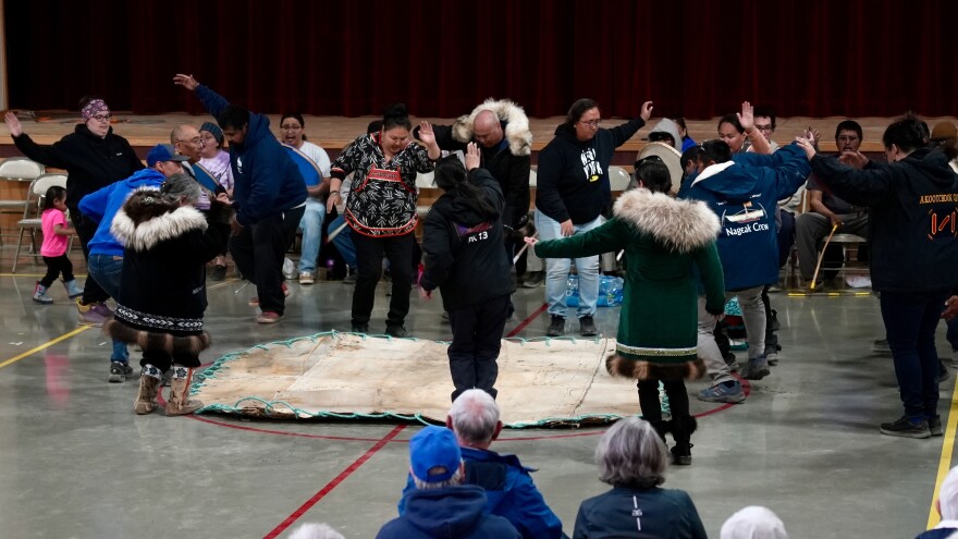 Several whaling crews join in a traditional Inupiaq dance during Nalukataq.