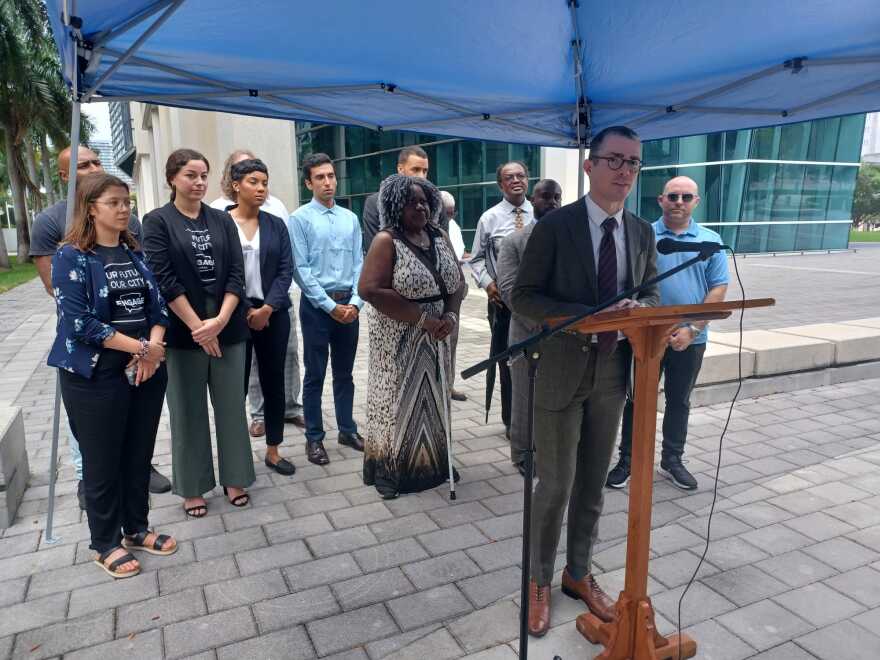 ACLU of Florida attorney Nicholas Warren flanked by plaintiffs in the racial gerrymandering lawsuit against the City of Miami at a June 2, 2023 press conference outside the federal courthouse in downtown Miami.