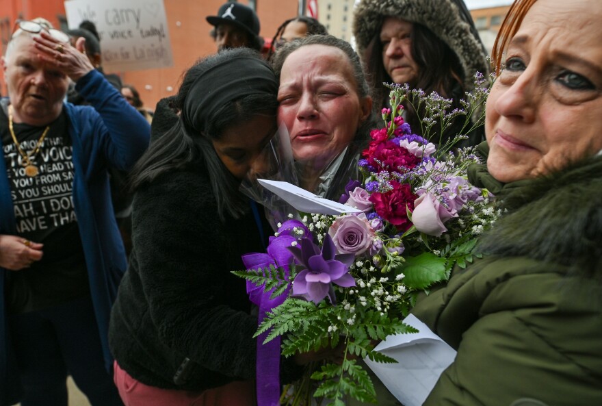 La'Niyah "Lala" Clark's grandmother, Sabrina Smith, is comforted during a protest outside of the Wilkes-Barre Police Department on Wednesday, Feb. 25.