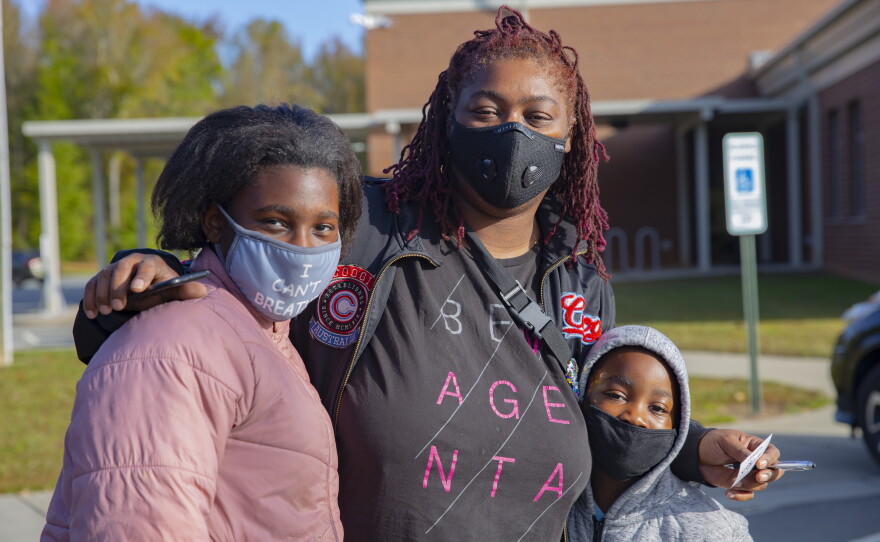 At Lawrence Orr Elementary, Chiquita Ravenel cast a vote with her children in mind -- and with her at the polls.