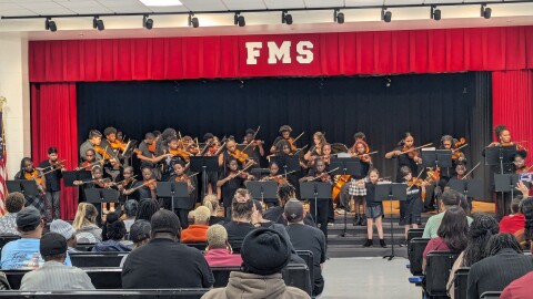 The combined elementary and middle school ensembles of the Li'l Mozarts.
