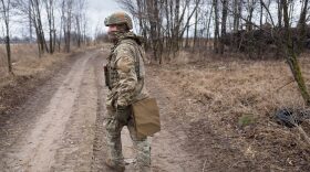 A Ukrainian serviceman on patrol in Sytniaky, Ukraine, west of the capital. Russia continues its assault on Ukraine's major cities, including the capital Kyiv, a week after launching a large-scale invasion of the country.