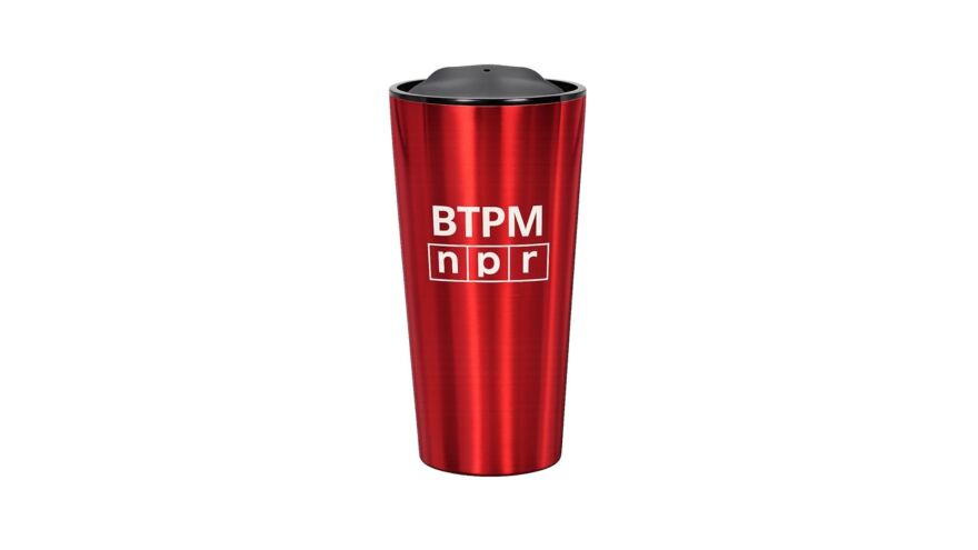 red travel coffee mug with a white BTPM NPR logo against a white background