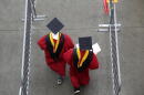 New graduates walk into the High Point Solutions Stadium before the start of the Rutgers University graduation ceremony in Piscataway Township, New Jersey. (Seth Wenig/AP)