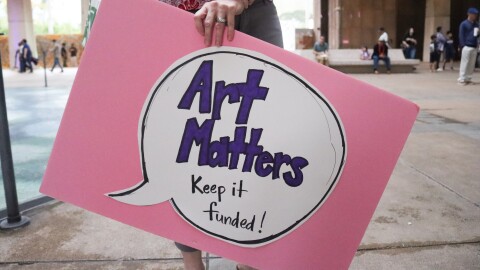 art matters, keep it funded sign held at the state capitol