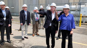 U.S. Energy Secretary Jennifer Granholm, right, and Democratic U.S. Rep. Joe Courtney, second from right, tour the Millstone Nuclear Power Station in Waterford, Conn., Friday, May 20, 2022. They are both working to change how spent nuclear fuel is stored nationwide to solve a decades long stalemate. (AP Photo/Jennifer McDermott)