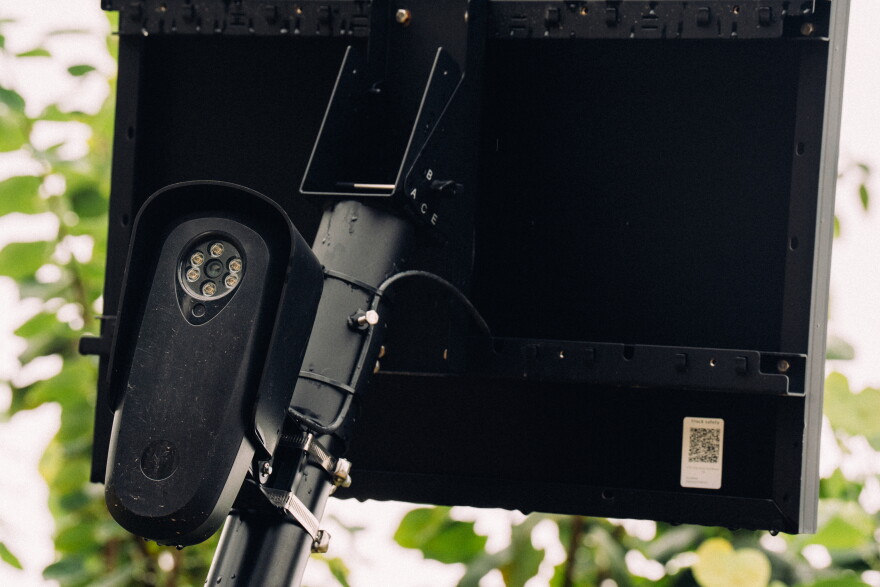 A Flock camera, commonly known as automated license plate readers, stands on the corner of a park on Sept. 10 in University City. St. Louis residents across the region have denounced the surveillance technology.