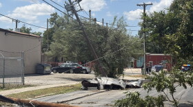 Storm damage at Flores and Cypress streets in San Antonio, where high winds brought down utility poles, power lines and tree limbs following Friday night’s severe storms.