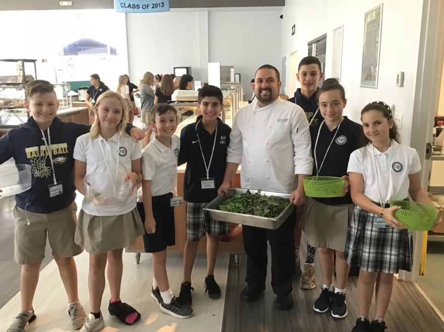 Students from North Broward Preparatory Schools grow produce in their school's garden to use in cafeteria lunches as part of their "Food Miles Matter" project.  