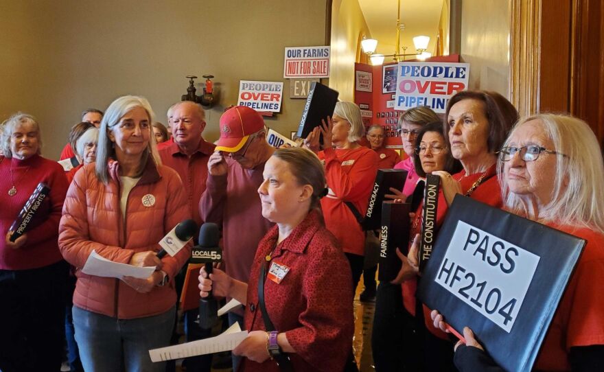 A group gathered outside the office of Iowa Senate Majority Leader Mike Klimesh Tuesday morning, urging him to support legislation prohibiting the use of eminent domain for carbon pipelines in Iowa.