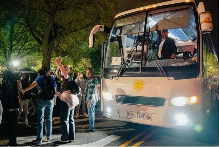 Two buses transporting migrants from Texas arrive at Union Station in Washington, D.C., on April 21, 2022. Gov. Greg Abbott announced his plans to add New York City as an additional stop for dropping off migrants.