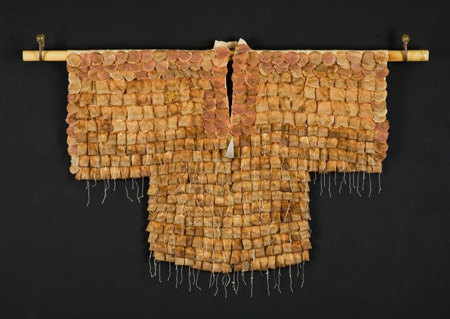 <em>Tea Ceremony</em>, a kimono made of used tea bags by Wewer Keohane. Much like a complex Japanese tea ceremony itself, Keohane says making her kimonos "is as much about the process as it is about the outcome."