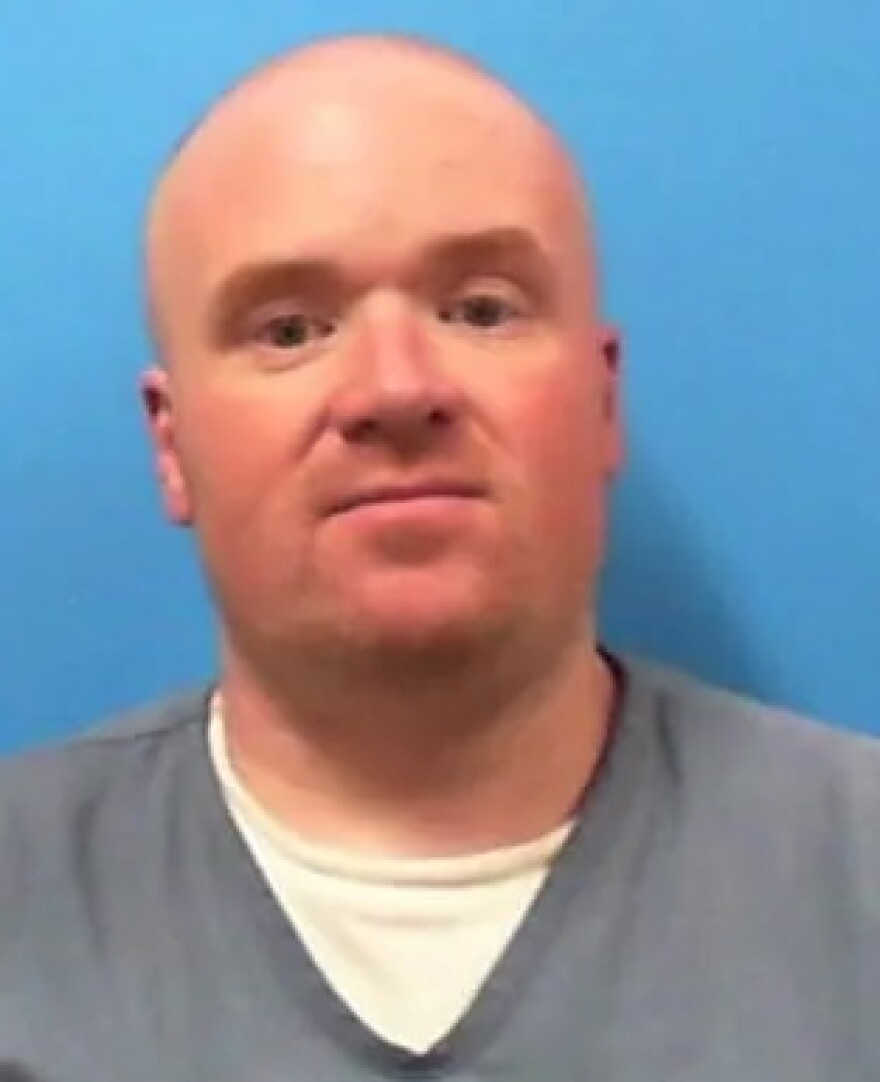 Richard Steven Cook used a photo of a 'better-looking' friend - 'Nick' - during an explicit online chat with an undercover officer pretending to be 13-year-old 'Megan.' This is Cook's actual prison mugshot.
