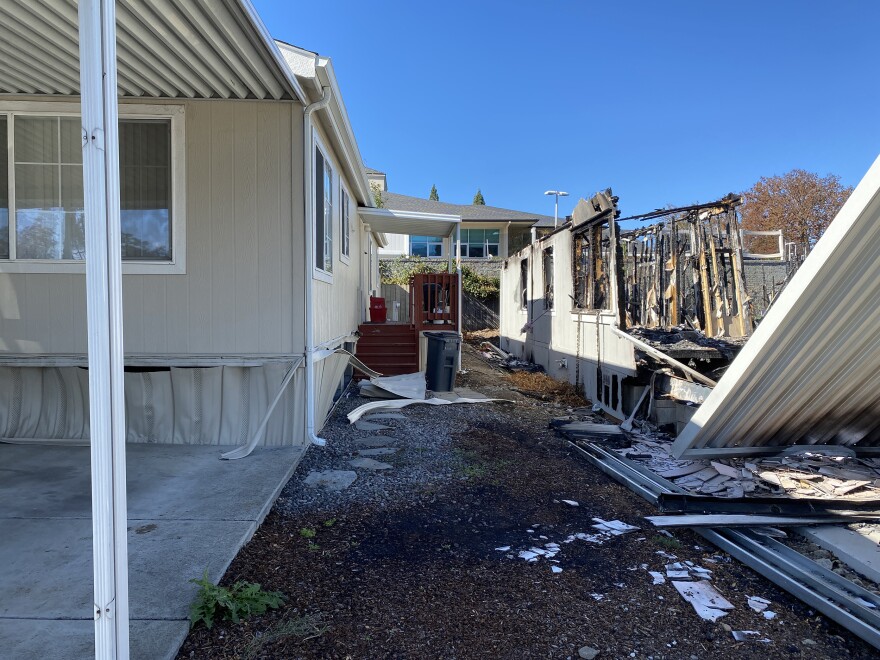 A manufactured home in Medford barely survived the Almeda Fire, but it took some damage. 