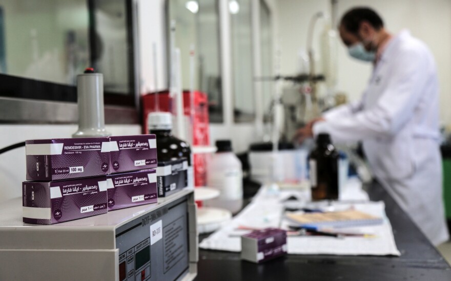 Boxes containing vials of remdesivir at a pharmaceutical company in Giza, Egypt.