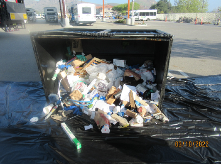 Ventura County prosecutors say theis is one of the dumpsters they audited which contained illegally disposed of materials from a pest control company.