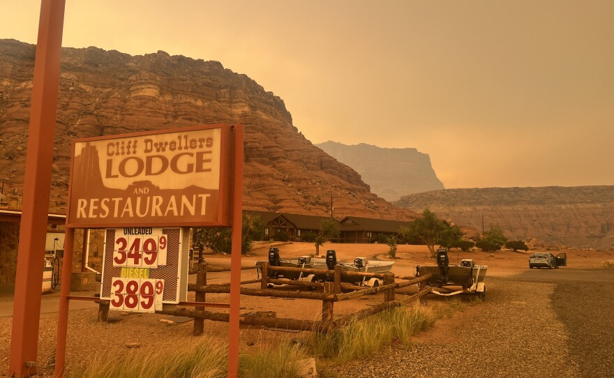Wildfire smoke casts an otherworldly shade on the Cliff Dwellers Lodge and Restaurant at the foot of the Vermillion Cliffs, Saturday.