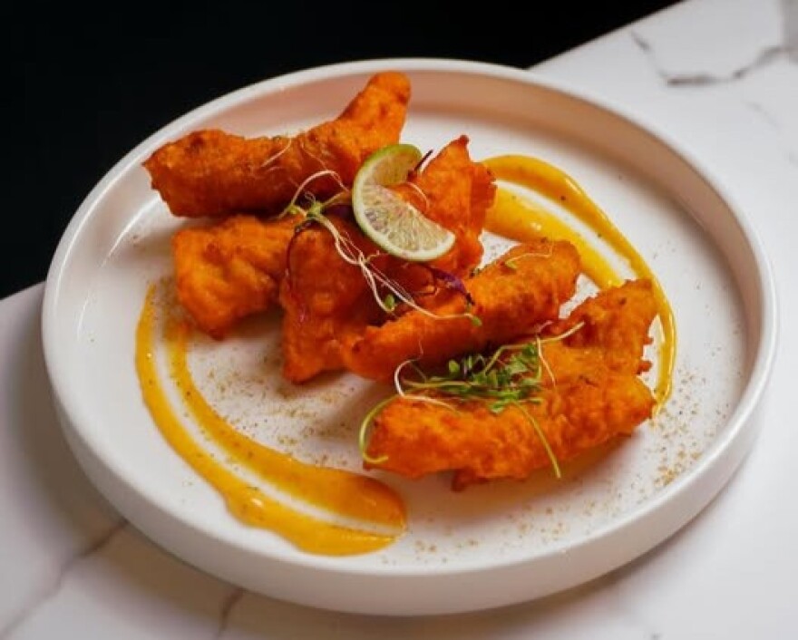 The Amritsati Fish at Aahaa Modern Indian Cuisine is battered, fried and impossible to eat just one piece of.