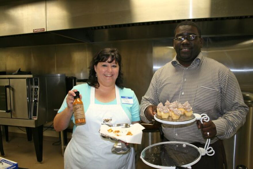Stacey Greco of Omi's Gourmet Foods and Kyshun Webster of Cupcakes & Co., two starts based at Edible Enterprises.