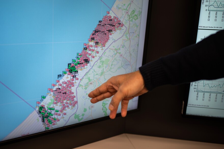 A map of Gaza in the Paltel headquarters shows areas where communications infrastructure has been destroyed or disabled.